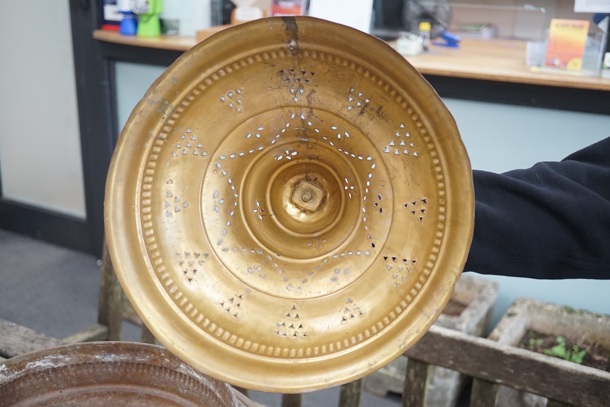 A Middle Eastern brass 'Mangal' brazier, with pierced decoration, 60cm high. Condition - good